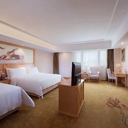 Vienna Hotel Shanghai International Tourist Resort Xiuyan Road Metro Station Branch Exterior foto
